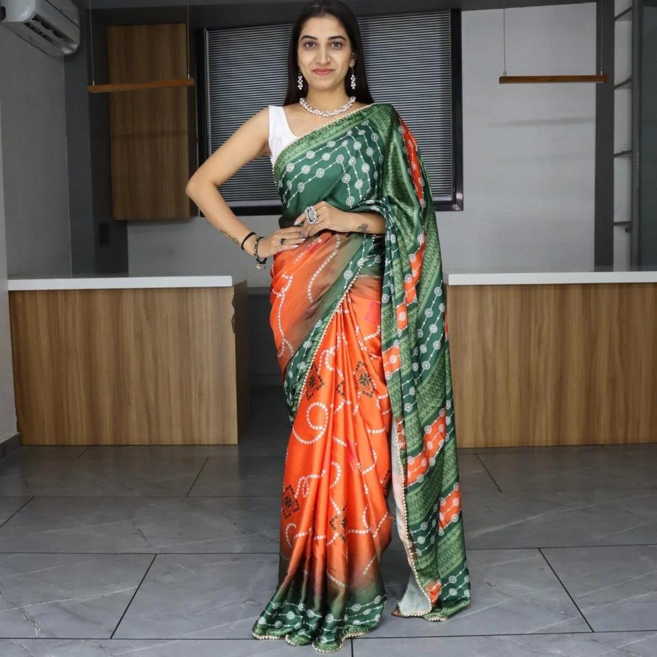 FlexFeb Traditional Bandhani Print Satin Saree in Green & Orange with Pearl Lace Border – Festive Wear