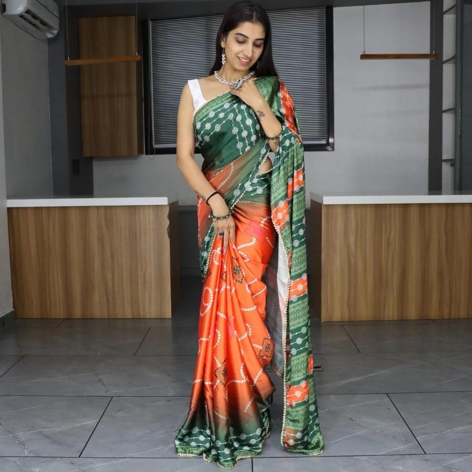 FlexFeb Traditional Bandhani Print Satin Saree in Green & Orange with Pearl Lace Border – Festive Wear