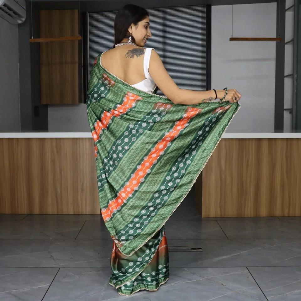 FlexFeb Traditional Bandhani Print Satin Saree in Green & Orange with Pearl Lace Border – Festive Wear