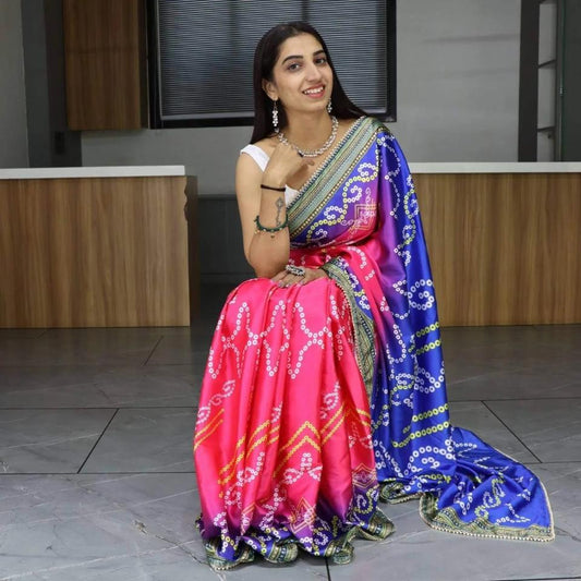 FlexFeb Bandhani Print Pure Japan Satin Saree in Pink & Blue with Pearl Lace Border – Traditional Festive Drape with Unstitched Blouse