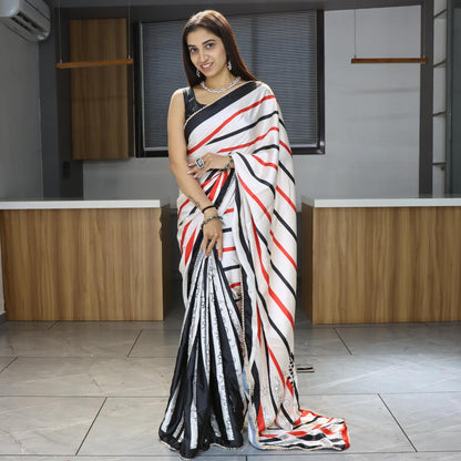 FlexFeb Modern Striped Japan Satin Saree in White, Red & Black with Pearl Lace Border – Stylish Party Drape with Unstitched Blouse